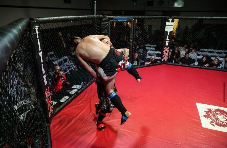 Michael Davtyan throwing a high kick