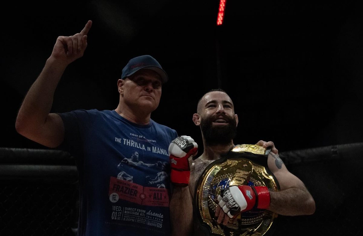 Michael Davtyan with his coach and the belt