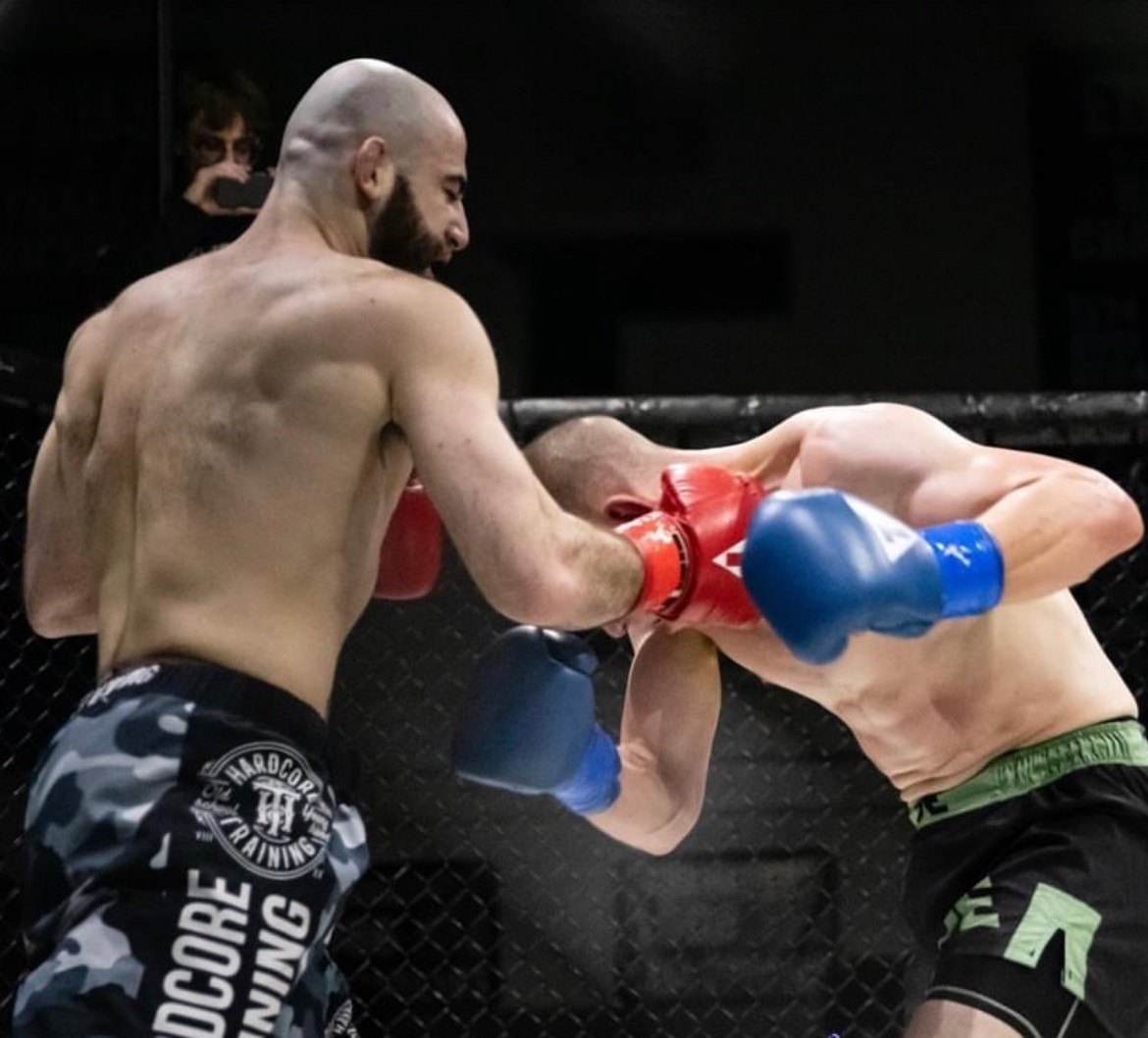Michael Davtyan landing a right hand